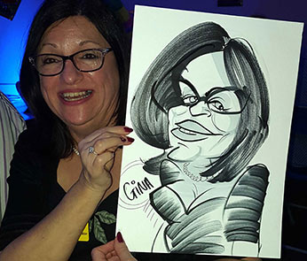 Gina showing off her caricature