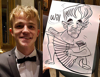 Will shows off his caricature at the school prom