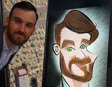 beard and green eyes are capture in digital caricature