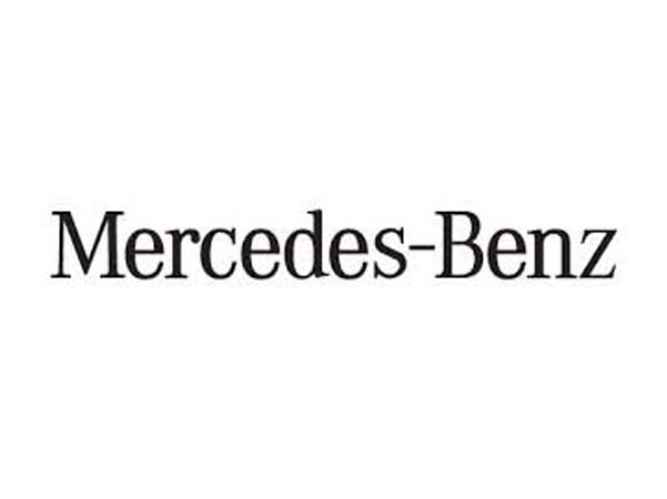 mercedes benz logo. Caricature artist draws in the show room