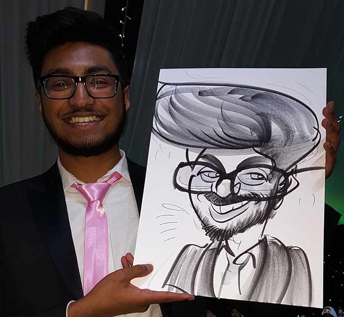 Asian Wedding in Slough and Artist caricatures a Wedding guest