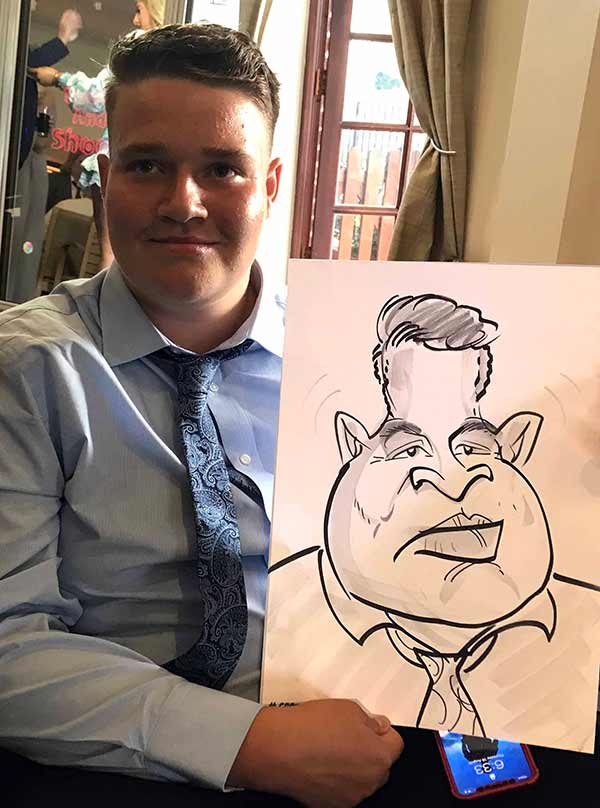 moody faced man likes his caricature