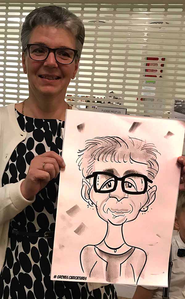 woman really likes her caricature in Reading