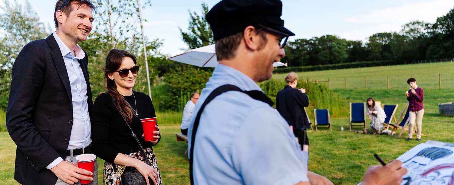 happy caricaturist in a field