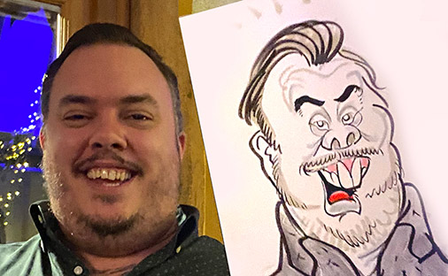 man in caricature at winter party