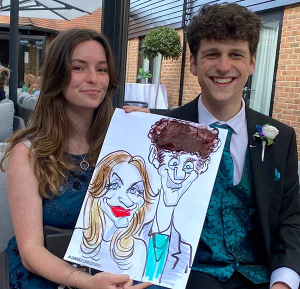 sister and brother pose for a picture