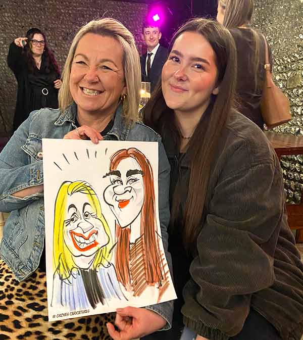 mother and daughter with there cartoon  caricature in ashford